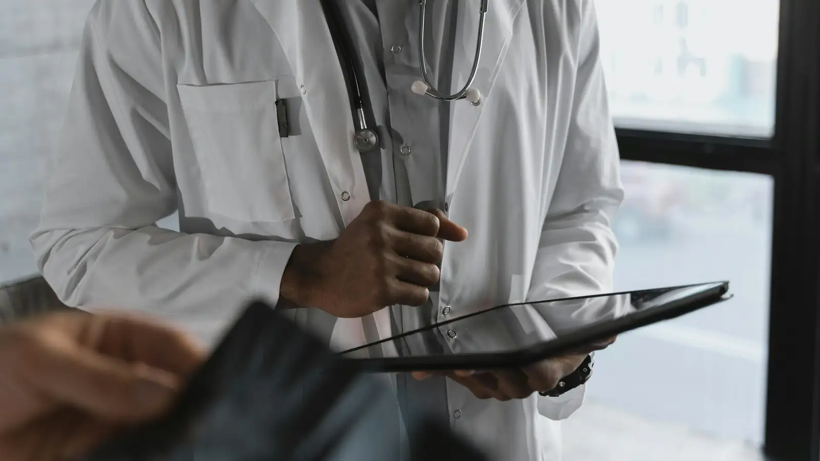 Healthcare appointment booking app on tablet